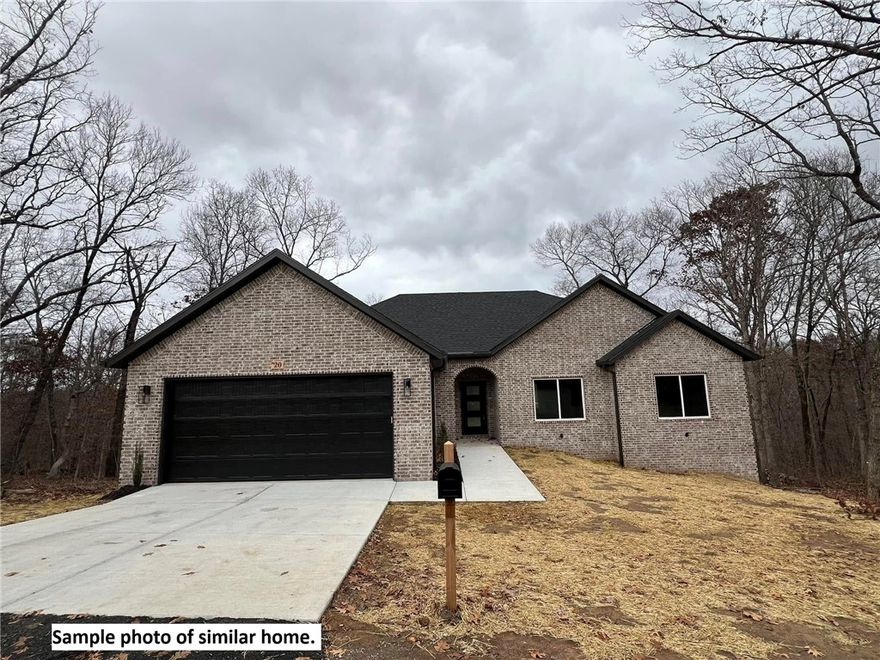 Beautiful new construction by Elite Thomas Homes. Estimated completion date is early September 2025. Get under contract early to choose some finishes and/or upgrades. Photos are of similar homes and finishes may vary. The home is .3 miles to the Back 40 trail access and 1.1 miles to Lake Ann via the Back 40 trail! Main level will have 2 bedrooms and an office, 2 bath, and oversized 2 car garage. Open concept floor plan with spacious kitchen, living room, and dining room. Vaulted ceilings with beams in the main area and a stack stone gas fireplace. Access the large covered and uncovered deck from kitchen. Large primary bedroom with walk-in closet. Primary bathroom has a dual vanity, tile shower, free standing tub and separate toilet room. Bedroom 2 and the office are on the other side of the home with a nice hall bathroom Partial walkout basement will have a larger media/gameroom with bar area,3rd bedroom with walk-in closet and bathroom with fiberglass shower. Also enjoy the 2nd covered deck from the basement.