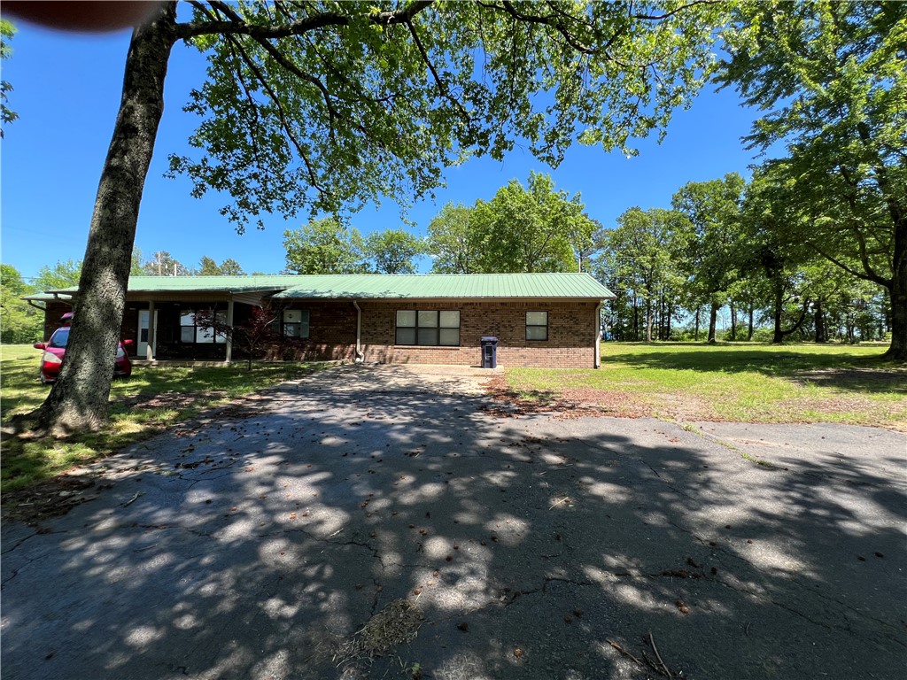 This three bedroom, three bathroom home has had a lot of nice updates including new flooring in most of the home, and nice updated primary bedroom and bathroom. Seller is giving a $4000.00 flooring allowance for the 2 bedrooms left to update. Enjoy the big yard with lots of room for family gatherings.