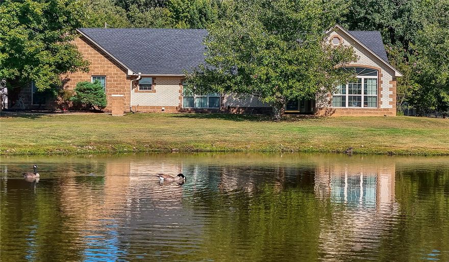 Located in the Pottsville School District, this property truly has it all: a Custom brick home, a 4,800 sq. ft. commercial shop, a guesthouse, an in-ground pool, & 10+/- acres! The main home offers 2,745 sq. ft. with 3 bedrooms and 3 bathrooms, including two en-suites, a sun room, and a 2-car garage.. Connected by a covered breezeway, you’ll find a fully heated and cooled 4-car garage (1,152 sq. ft.) that doubles as a game room, complete with an upstairs 1,296 sq. ft. guesthouse or separate living quarters. Additional amenities include a 240 sq. ft. hobby room, a safe room, animal kennels, and plenty of storage for every need. 
Outdoors, relax by the private pond or entertain by the sparkling in-ground pool, complemented by a 480 sq. ft. pool house with a full bathroom. With its combination of luxury, functionality, and acreage, this property is a rare find. Schedule your private showing today to see it all in person!