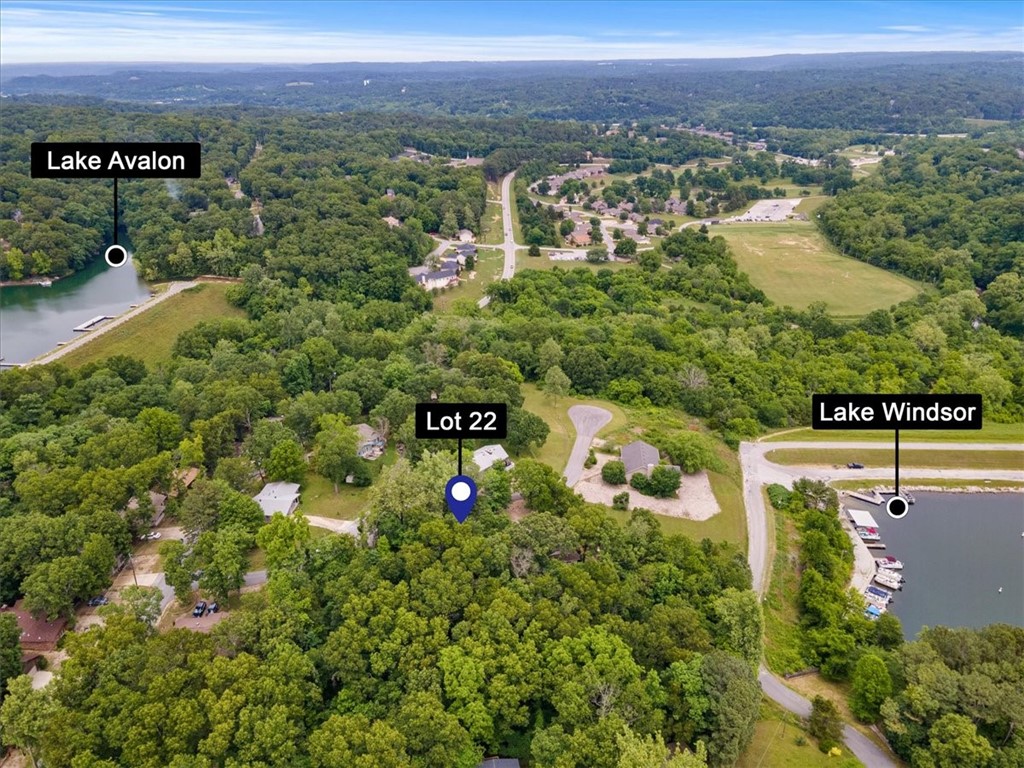 Fantastic lot with potential views of Lake Windsor! Situated in an amazing location between Lake Avalon & Lake Windsor, close to SO many Bella Vista amenities, including the heated fishing dock at Lake Avalon, motorboat-approved Lake Windsor with nearby boat ramp, the Lake Windsor and Lake Avalon Dams, MULTIPLE mountain biking trails including the Lago Vista Spur, Tanyard Creek Nature Trail and the Tanyard Creek Golf Practice Center and the Bella Vista Country Club Golf Course & Clubhouse! Just minutes from U.S. Hwy 71 and Interstate 49.