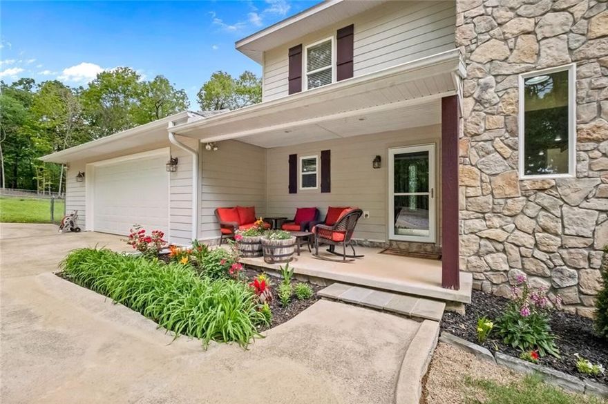 Discover this beautiful 4bed, 4bath home in a peaceful, wooded setting. This multi-level home offers space, functionality, and comfort. Inside, enjoy an open-concept living room and kitchen with a large walk-in pantry, perfect for entertaining. The main floor also features a sunroom, a bedroom, full bathroom, and a dedicated home office. Upstairs, enjoy a spacious primary suite with a luxury walk-in closet and private ensuite bath. You'll also find another generously sized bedroom with a walk-in closet, full bath, and convenient laundry room. The finished basement is perfect for extended guests or hosting events, featuring a second kitchen with pantry, a large recreational room, utility closet, and a bedroom with full bath and walk-in closet. Located just 3.5 miles from Lake Atlanta and 4 miles from Downtown Rogers.