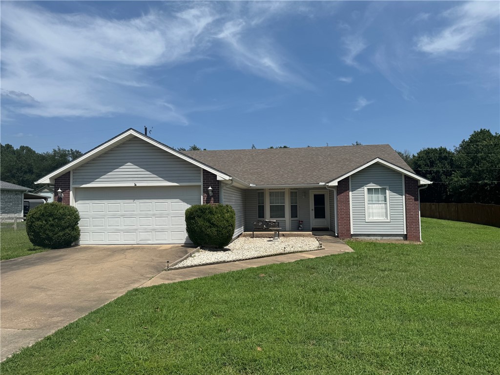 One-owner home on 1 acre in Farmington - Hard to Find! The home is 1,564 sq. ft. heated & features 3 BR, 2 BA, 2 car garage, oak cabinets, split bedrooms & is in very good shape. A detached 20x32 workshop with electricity is included. First time on the market. Same owners since 1994 when it was new.