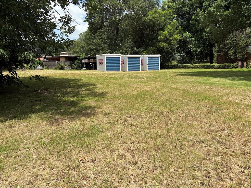 Build your new home on .38 acres close to desirable shops are restaurants in downtown Springdale. Walking distance to Springdale High School. Only one street back from Emma Ave. Mature trees surround property for a private and cozy feel.