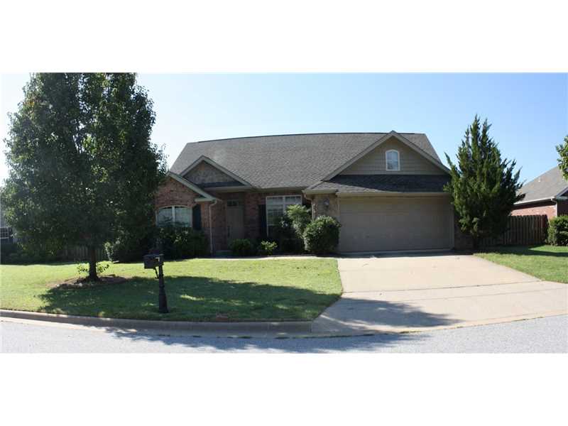 Great 4 bedroom split plan, with nice eat in kitchen and formal dining area. Refrigerator, washer & dryer convey as a gift to the new owners. Fenced backyard.