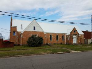 Beautiful church with fellowship hall near downtown Russellville! Built in 1924 this gem still looks as good as ever. Tall vaulted ceilings with huge wood beams that sky across to the top. Antique stain glass window throughout and a brand new metal roof. Come take a look at this historic beautiful building before its to late!