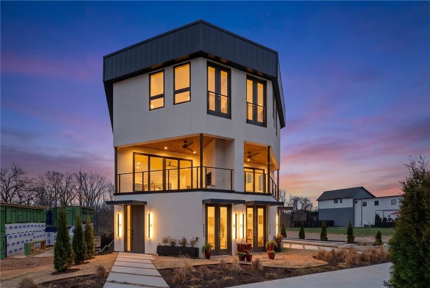 Welcome to the pinnacle of elite trailside living at the exclusive Fillmore Trailside! This custom townhome (2280sqft ft, 3br, 3.5 ba, 2.5-car garage) offers an unparalleled location: private, immediate access to one of Slaughter Pen's most well-known locations. Roll straight onto elite flow, massive berms, & progression features. After a dream day of riding, pedal or stroll just minutes to the unmatched lifestyle of Bentonville Square. Inside the home luxury details elevate every moment: custom floating staircase, solid wood cabinets w/ lighting, quartz countertops, GE Cafe appliances & a side-by-side premium refrigerator/freezer, designer tile, oversized double sliding glass doors, wine fridge, floating bathroom vanities with under-cabinet lighting, tankless hot water, and ample storage! Relax on the 2nd-floor balcony with gas fireplace & gas grill hookup—ideal for unwinding after days of work & adventure. Where world-class mountain biking meets sophisticated downtown living. This is Bentonville at its finest.