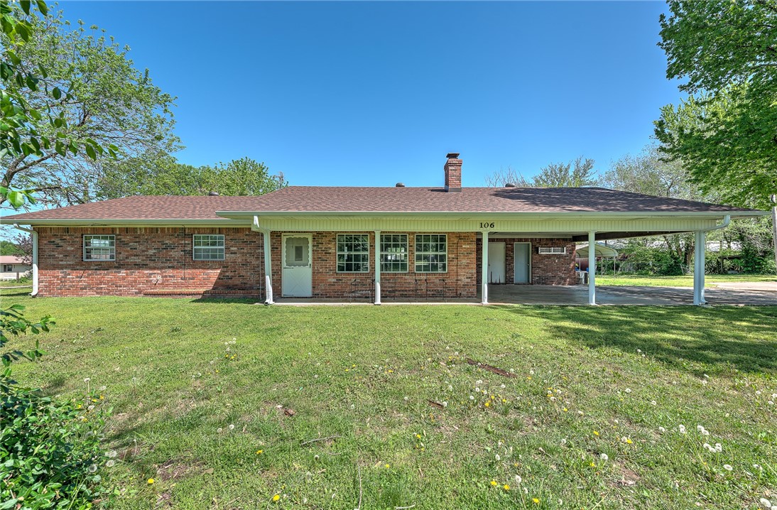 This is an incredible property in Gravette. It was once the church parsonage Roof is less than 1 year old, and the all brick house is on a corner lot approximately .60 acre. Fenced in back yard. The home is 4 beds and 3 baths, with a roomy living area and kitchen/dining area. The living area has a brick wood burning fireplace to warm those winter nights. 2 car carport. House is being sold 'As Is".