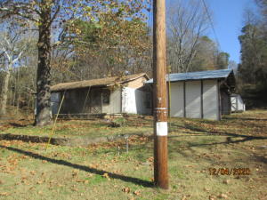 Frame 3 BR, 1 bath home on 3.91 acres, detached 2 car carport, and 2 storage sheds. Home is sold ''as is''. All offers are to be submitted through PROPOFFER.COM. The minimum sales fee is $750.00
