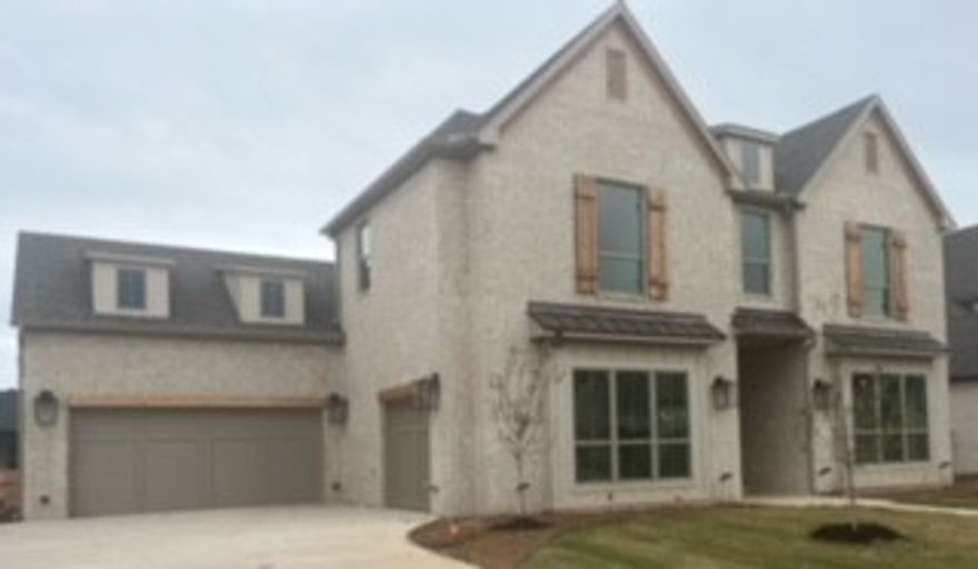 Great Open Floor plan with floor to ceiling windows 12 ft ceilings in living and kitchen area, 2 bedrooms on the main level including owners suite 2 bedrooms and game room upstairs. Covered patio 3 car garage