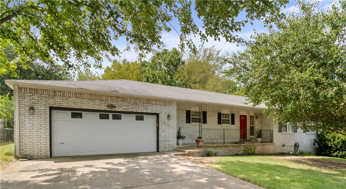 Don't miss this opportunity to find HOME just 2 blocks from access to the Razorback Greenway & JB Hunt Park. 2150 ft², 4 Bed, 2.5 Bath on .44 acres with an oversized living area, 300 ft² covered deck, large laundry/mud room, 36" extra wide interior doors & nearly floor-to-ceiling windows throughout. This all-brick home on a quiet cul-de-sac is just a quick bike ride on the Greenway to Downtown Springdale. Newer HVAC & AC units replaced in 2021. New bedroom carpeting in 2023. Living area LVP updated in 2019. Great investment opportunity for rental property or for first time home buyers. The 4th "bonusā bedroom off kitchen/utility room has its own private entrance/exit through garage. Refrigerator to convey. Come by on Sunday to see it for yourself.