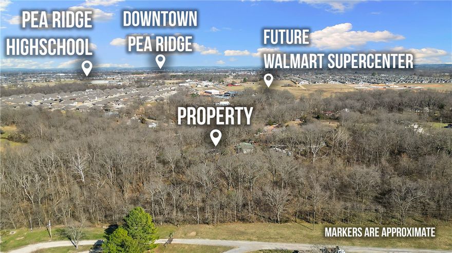 At the end of the gravel road, 10368 Johnson Hollow Road sits on 13 acres ready for your family — or your next development opportunity. Perfectly positioned near the Pea Ridge/Bentonville line, this location is close to everything we love in NWA.
Pea Ridge continues to grow, highlighted by the announcement of a new Walmart Supercenter just across Hwy 72 from the property, a nearby disc golf course, and ongoing residential and commercial development.
The 13 acres are split into two parcels — 10 acres and 3 acres — providing multiple beautiful building site options. The value is in the land, but the existing home sits on the 10-acre parcel and offers the opportunity to remodel or rent.
The home is on septic and features spring-fed water (no water or sewer bill), electric service, a large propane tank, and even a storm shelter for added peace of mind.
With continued growth in the area, this property presents potential for stunning homes on spacious lots or a place for your family to build your dream home.