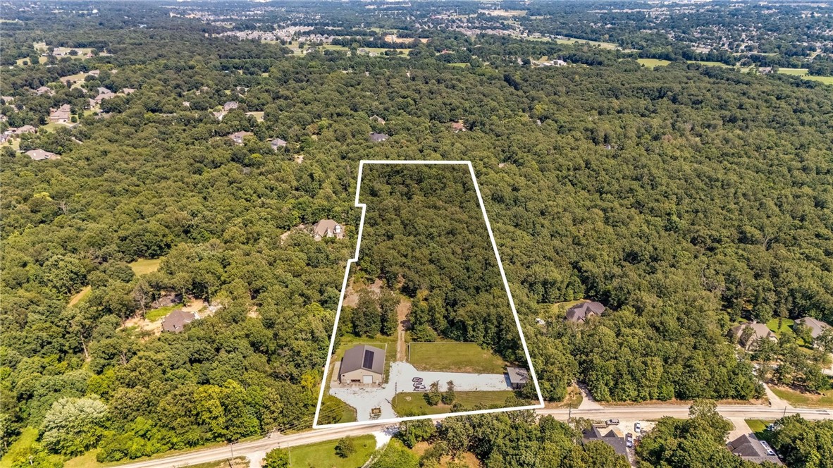 Auction 08/30/2025 at 10:00 AM
Unique opportunity on Double Springs Rd! This 7.21-acre property features a versatile 60' x 60' shop building with approximately 1,620 square feet of finished living space. The living quarters include 3 or 4 bedrooms, 2.5 bathrooms, and zone-controlled heating and cooling for maximum efficiency. The building is equipped with solar panels, an irrigation system, and a 9' x 30' concrete-form safe room. With roughly 1,800 square feet of shop space and multiple potential building sites, this property offers incredible flexibility for residential, hobby farm, or business use. A rare blend of function, comfort, and acreage in a prime location!