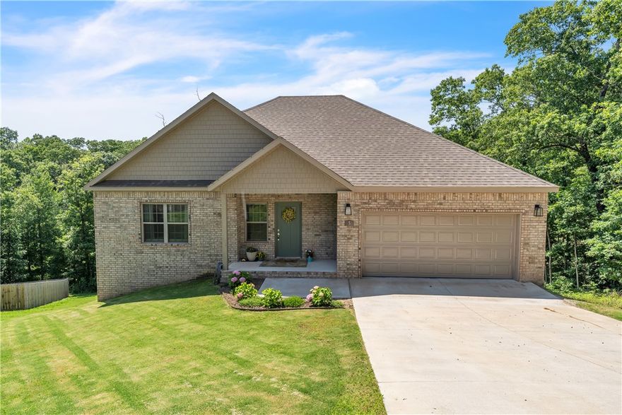 This home is a great home for the outdoor enthusiast! Mountain biking? Closest to Pinyon Crk, Sbat, Flo Ride, and Summit School trails. The ledges, Back 40, Taylor Homestead, Skip Town, & Rago trails are also nearby. If you're into lake life, you have Brittany just across the street with Lane Ann, Rayburn, and Norwood close by as well. Golf? You got it, the Metfield complex has Dogwood & Brittany a few minutes away with Country Club, Kingswood, Berksdale, and Tanyard Creek across 71. The home has 3 beds, 2.5 Baths & a 2-car garage. It has two covered decks for outdoor entertainment, two living spaces up and down for indoor entertaining, a double oven, a gas fireplace, granite countertops, a large kitchen island, a pantry, wainscotting in the formal dining, his & hers closets in the primary, a floor to ceiling tiled shower, a separate tub and a double vanity. Sitting on an expansive lot, the location and floor plan allow indoor/outdoor entertainment & an active lifestyle.