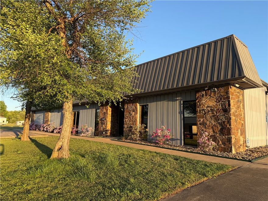 Light Industrial & Manufacturing warehouse in Stephens Industrial Park. 1 10 x 12 grade level door with 14' side wall; 25 surface parking spaces; 3 phase electric;  1 mile from I-540; 1/2 mile from Hwy. 71 South & .3 mile from Hwy. 45.  also for lease for $5,500/mth;