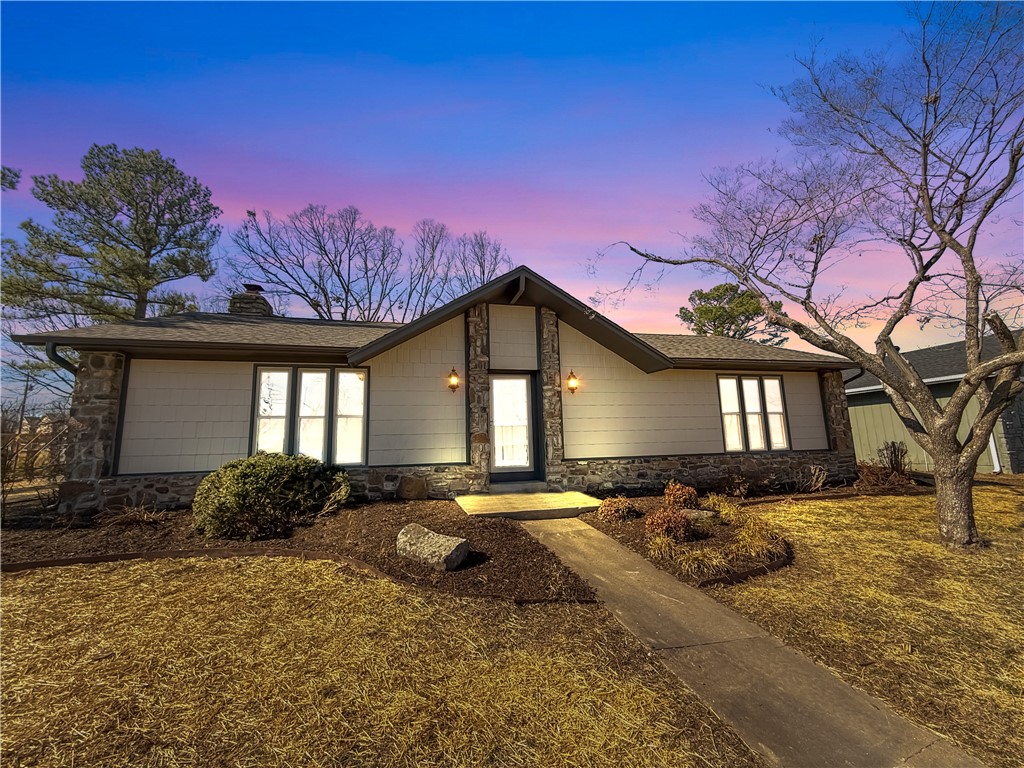 WELCOME HOME!! This 3/4 bedroom, 2 bath home has been completely remodeled w/ almost NEW everything! Stone Harbor Custom Homes did AMAZING w/ this remodel & all permitted w/ the City of Rogers. Great location off New Hope near I-49/Promenade/AMP & a 5 minute walk to Dock Wheeler Park & Rogers Aquatic Park. Open floorplan, light & bright w/ luxury plank flooring throughout (no carpet) & plenty of natural lighting w/ skylights. Beautiful floor to ceiling rock fireplace in the LR that opens into the dining room & kitchen. Lots of rock interior & exterior accents & the backyard is full of rock flower beds ready for your favorite bulbs. New privacy fence with a double gate on the garage side & a 8x8 storage building. Home is located on a corner lot w/ a side load garage & on a cul de sac street. See Attachment in MLS for new items list (Roof, HVAC, flooring throughout, bathrooms, fixtures, hardware, built in's, appliances, fence w/ double gate, window, new interior & exterior painting) Come check it out!