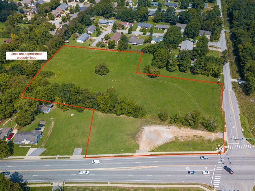 Unlimited opportunities & potential with this 5.24 acre corner lot with road frontage on both Hwy. 16E and Stone Bridge Road. Hard to find, great hard corner location for a multitude of business opportunities. Possible commercial options on front highway frontage and mixed use in back section with additional road frontage. Design your strip center or business in front with apartments or residential in back or business center. Enjoy huge future growth potential on this busy corner lot.