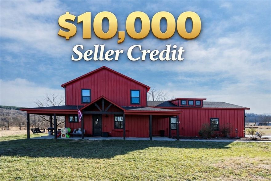 Welcome to your dream home where modern farmhouse meets wide-open space & breathtaking views. Built in 2023, this stunning home sits on 6 scenic acres and offers 4 bedrooms plus an office or an optional 5th bedroom, 2.5 baths, & thoughtfully designed living spaces. Has soaring vaulted ceilings, warm LVP flooring, barn door accents, propane fireplace, granite countertops, ample cabinetry, large walk-in pantry tucked under the stairs, formal dining room, huge custom tile shower, freestanding soaking tub, and generous walk-in closets in all bedrooms offering excellent storage throughout the home. Upstairs, enjoy a bonus/second living area or additional flex space. Energy-efficient with 2x6 exterior walls, spray foam insulation, LED lighting, & total electric utilities. Oversized 2-car garage with loft storage & 10x10 insulated doors. Huge covered porch, covered patio with privacy fence, hot tub hookup (hot tub may convey), & a 2,640 sq ft shop only 8 months old. Rural setting close to Fayetteville and Siloam Springs.