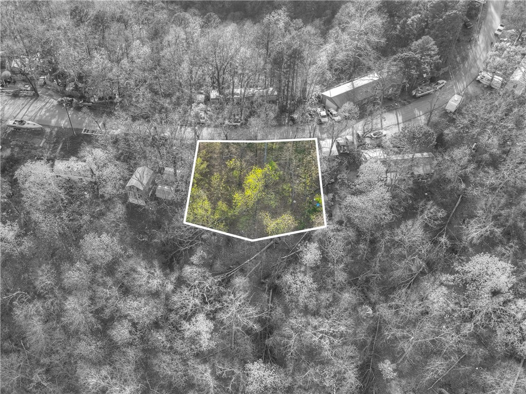Build your dream home or next investment on this gorgeous 0.43-acre lot! Tucked away this property offers the perfect mix of seclusion and convenience—just minutes from schools, shopping, and everyday essentials. The gentle slope makes it ideal for a walk-out basement, giving you even more potential to create the space you’ve always envisioned.