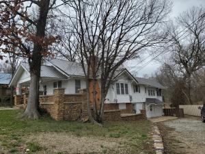 Own a piece of Berryville History with this home that was built by the Hanby family. Original pine floors in part of the home, As you enter the basement there are two large rooms that could be bedrooms or work rooms as you ascend the stairs you enter the large kitchen and just off the kitchen there is a large family room then deck on one side and large dinning room on the other side and continue to the den.Two bedrooms are also on this main floor. Two full baths complete this home that is right in town so easy access to shopping, work or school. Home has been used as a rental $750. per month
