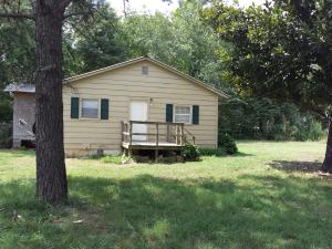 Cute starter home for small family. Nice level lot just outside of town. This home my be old but has solid bones and original wood floors with a metal roof
