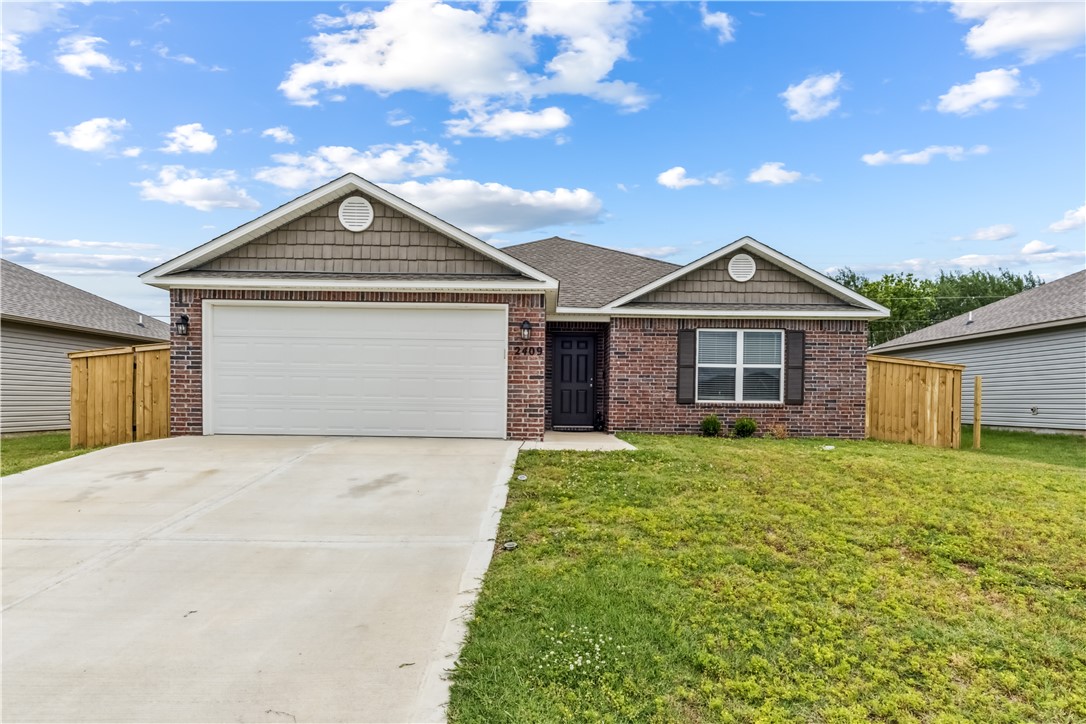 Discover this beautifully crafted 3-bedroom, 2-bathroom home, built in 2024 and move-in ready. This nearly new property features an open-concept layout with a spacious living room, a bright dining area, and a modern kitchen equipped with energy-efficient stainless steel appliances, generous counter space. Enjoy outdoor living on the covered back porch overlooking a fully fenced backyard recently added by the seller. Perfect for privacy, pets, or play. Located in a family friendly community with access to a playground, this home offers the perfect blend of comfort and convenience. Situated close to schools, parks, shopping, dining, and just 20 minutes from Tontitown, this home is an excellent opportunity for buyers seeking modern living in a prime location. Sold As-is.