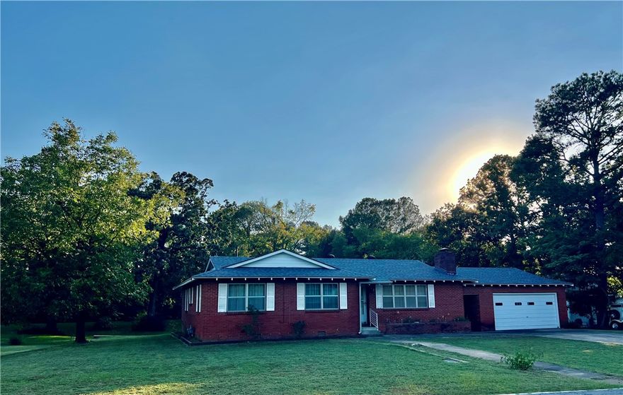 Room to grow 1357 ft.² of heated and cooled living space on almost an acre in city limits of Clarksville. enjoy looking at your barn from a large open porch overlooking your luxurious almost 1 acre yard and an attached shop/garage that is a 22 x 22. Also 3 spacious bedrooms with lots of windows, 2 newly remodeled bathrooms, a almost fully remodeled kitchen, ready for you to put your own creative finishing touches. original doors and drawers still on site along with other remodel supplies that are to go with the home. Newer, Heat And Air units, newer, tankless, gas, hot water system, A Large Brick fireplace that centers the living room and dining room areas. This home has over 2300 ft.² under roof. Large established trees in the backyard, partial fencing. Call for your showing appointment today.
