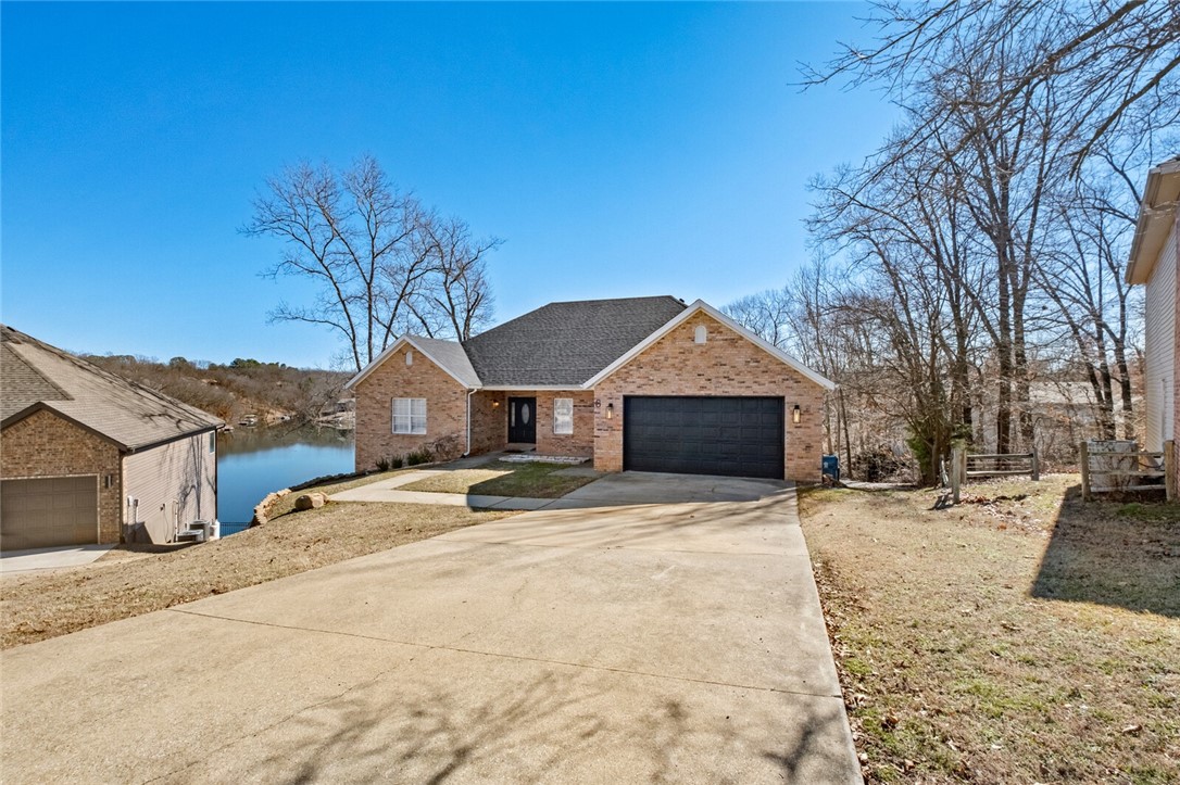 Completely renovated Lakefront home. This home was professionally renovated & updated. It has a successful tenure in the Short-term rental market and has been permitted by the city. Two-story with walk-out basement. Multiple living areas, two kitchens. Lake Front is one of the fantastic Bella Vista lakes.
The home is a short-term rental.