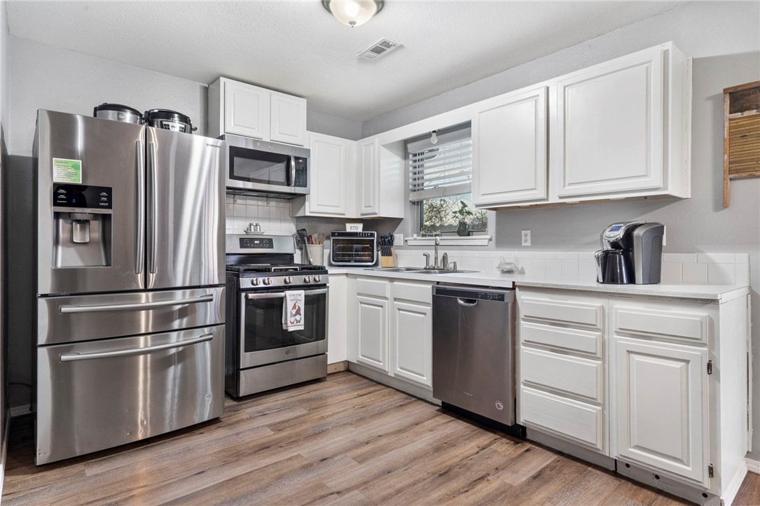 Well-maintained 3-bedroom, 2-bathroom home with 1,352 sqft. Features include a new roof with gutters, all new UV-protectant windows, luxury vinyl plank flooring, and a 200-amp RV hookup. The eat-in kitchen opens to the living room on an oversized lot at the end of a cul-de-sac. Several items have been updated and maintained for convenience.