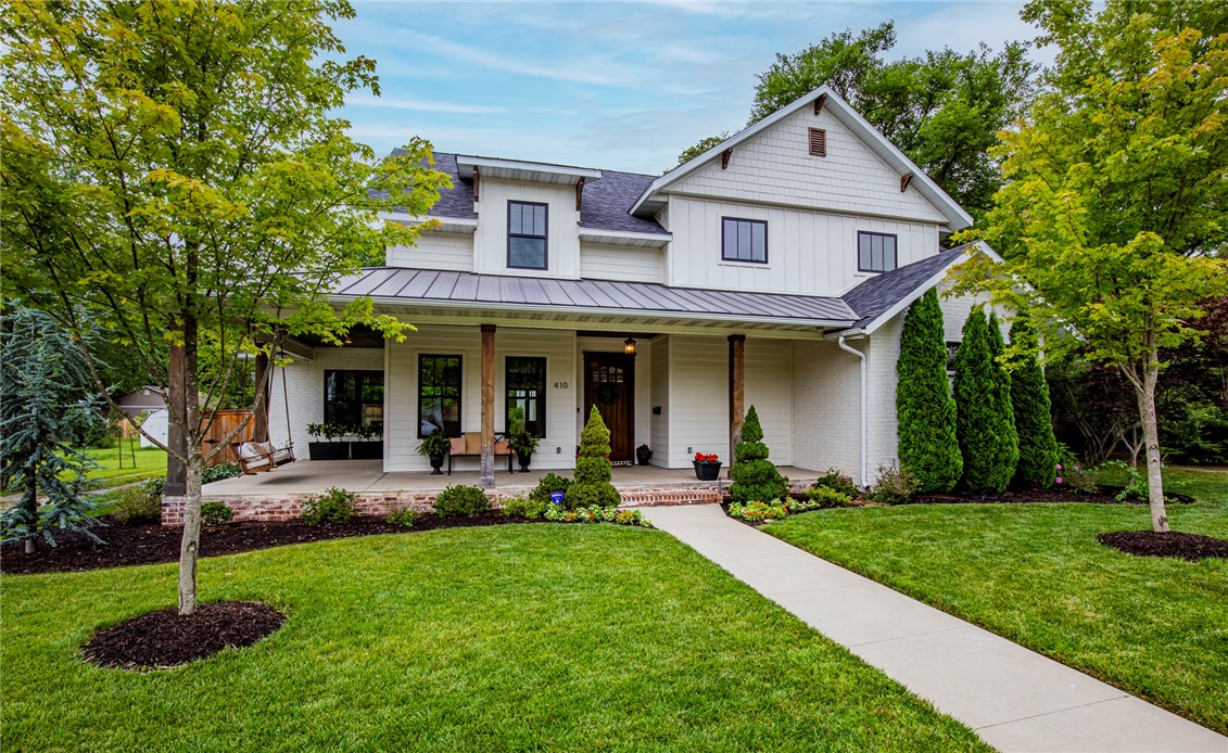 Live the highly desired dwtn Bentonville lifestyle in this custom built home by HGTVās Dave Marrs. Blocks away from the square, world class mountain biking trails, museums, eateries, coffee shops, and outdoor events, you can enjoy small town life with big city amenities. No expense was spared in this exquisite home. Natural light flows through the black, full length windows cascading into the large, open floor plan that creates a warm and inviting space that overlooks a backyard oasis complete with heated saltwater pool, hot tub, covered porch, and outdoor kitchen. Perfect for entertaining: large kitchen with a 48ā range, an oversized pantry, a large island with stunning Quartzite countertops, and eat in kitchen all adjacent to the living room with built-in shelving which features a beautiful brick fireplace. The main house is 3750 sq. ft w/ an 813 sq. ft garage apt. perfect for guests, mother-in-law suite, or to start an income producing Airbnb. This house checks all of the boxes and is ready to call home.
