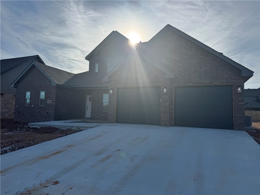 East facing new construction home in Woodlands Crossing! 2 bedrooms downstairs and 2 bedrooms upstairs. Several of the features in this home include an upgraded 3 cm quartz counters throughout, upgraded tile backsplash, a designer brick fireplace, 4 disk lights in all of the bedrooms. Other amenities include custom cabinets with soft close hinges, stainless steel appliances with a designer gas range vented to the exterior, tall ceiling, low-e windows, designer lighting, luxury vinyl plank flooring, low-e windows, 2" faux wood blinds, full privacy fence with two walk gates, full gutters with downspouts, irrigation system in the front and back w/ an exterior control, lots of trees and more! Preferred lenders are paying up to $5,000 toward closing costs, prepaids, or discount points.