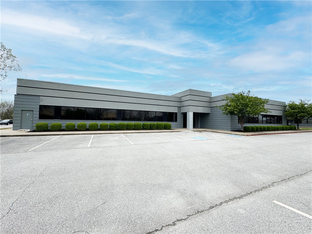 This recently renovated, 14,388 sq ft office building features 25 offices, 7 conference rooms, and a fully equipped test kitchen. The innovative design of the property encourages both creativity and productivity, truly setting it apart from other commercial spaces. It's conveniently located close to Walmart Home Office, Sam's Club Headquarters, and the bustling downtown of Bentonville, making it an enticing space for any business. Building is devisable down to 4,042 SF.