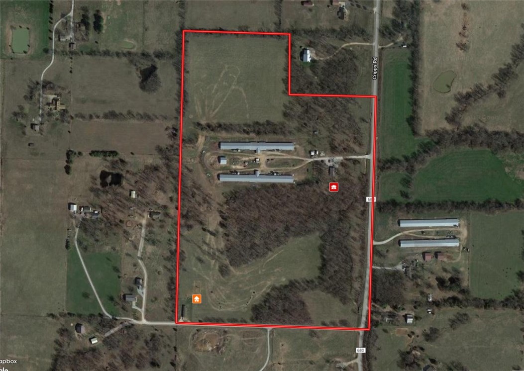 Top-notch established hen farm in a nice location! Gross income with slat-less (open floor) system produces $150,000 average annually. Both barns are 40x530 with the egg room in the middle. Tyson Springdale contract. 54 acres is mostly open with good pasture in native grasses. Cattle corrals and chute, wash room, extra income from a rental mobile home, make a productive farm. In 2011 the brick home received some energy updates like additional attic insulation, a metal roof, and double pane vinyl windows. Around the home are some pleasant outdoor spaces that make life enjoyable when the farm work is finished.