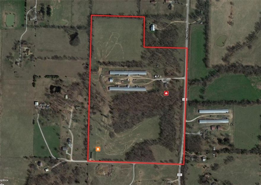 Top-notch established hen farm in a nice location! Gross income with slat-less (open floor) system produces $150,000 average annually. Both barns are 40x530 with the egg room in the middle. Tyson Springdale contract. 54 acres is mostly open with good pasture in native grasses. Cattle corrals and chute, wash room, extra income from a rental mobile home, make a productive farm. In 2011 the brick home received some energy updates like additional attic insulation, a metal roof, and double pane vinyl windows. Around the home are some pleasant outdoor spaces that make life enjoyable when the farm work is finished.