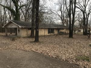 Super cute three bedroom two bath, large room home close to ASUMH. Located on a dead end street. Very nice hard wood floors and located on a large lot! Home needs some TLC! Would make a great first time home buyer or quick flip!