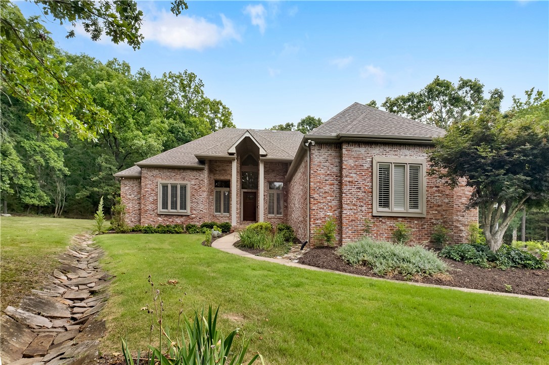 Welcome to your own private oasis on Fayetteville's East side! This beautiful home is situated on 3.6 acres of wooded land, giving you plenty of privacy while still being located less than 2 miles from schools, dining, and shopping. Step into the warm and inviting living/dining room. The open kitchen room provides a casual atmosphere. Completely updated appliances in the kitchen make cooking joyous and enjoyable also with a coffee bar. This 4 bed, 4.5 bath home is perfect if you need extra space, as each bedroom has its own attached private bathroom - including the large master which is located downstairs along with one secondary bedroom. Upstairs you will find two large bedrooms - plus two more bathrooms! No shortage of storage either; this house comes complete with an pantry and
utility room, bright and cherry sunroom and a large bonus room.
