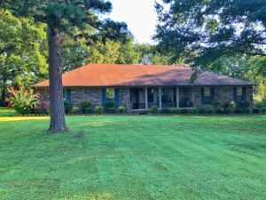 Paradise Found! This incredible home on 1.69 acres in scenic Golden Pond offers a lifestyle you will love to live with a large living room topped with a cathedral ceiling and with a lovely fireplace focal point, a formal dining room off the spacious kitchen, three large bedrooms, and even a great hobby room! Outside is where the fun begins with a gorgeous inground pool, a deck that begs for bar-b-ques, and a huge beautiful yard full of gorgeous flowers and shade trees. There is so much to love in one place!