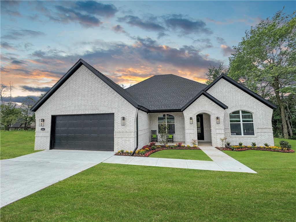Princeton 4 Plan in Henderson Park, our newest Community located in Fayetteville! These homes will be 4-sided Brick. The Kitchen will have an oversized kitchen island, quartz countertops and 42-inch upper cabinets with top molding with an Upgraded Stainless steel appliance package. The Living room will have a Beautiful Gas Fireplace. LED lighting throughout! 2-inch blinds throughout! Ceiling fans! High efficiency air conditioner system with Programmable WI-FI thermostat! Tankless hot water heater! Bedroom one will have double sinks, oversized walk-in shower, and a SOAKING TUB!! Covered Patio! Gutters included! Springdale Schools. Taxes TBD.
