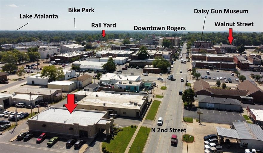 Location, Location. Fantastic building located in Historic Downtown Rogers just off Walnut St. Could be converted to endless possibilities. Would be a great brewing company if you added a roof top patio. Close to the Railyard Park, restaurants, shops & entertainment. Minutes to Lake Atalanta. Rollup door in back.  4224 SF of opportunities.