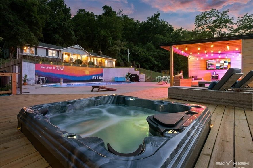 Turnkey, fully furnished operating short-term rental with a strong track record and professional management in place. The management company—part of the listing brokerage—has agreed to continue management for the buyer at a significantly reduced rate, if desired. This 5-bed, 2-bath retreat offers spacious living areas, pool, hot tub, multiple outdoor gathering spaces, and easy access to Prairie Creek, Lake Atalanta, and downtown Rogers. More than $30,000 in future Airbnb revenue going into 2026 is already booked and may transfer to the buyer. A rare opportunity to purchase a high-performing STR in a sought-after location. All furnishings convey.