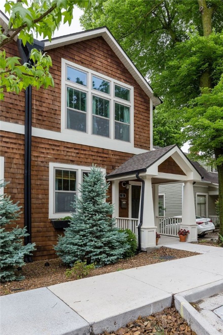 Gorgeous townhome in Fayetteville’s downtown arts corridor! Home offers 2,215 heated sq ft of living space which includes 3 bedrooms, 2.5 bathrooms, living room, formal dining, eat in kitchen, separate laundry, & mudd room.  Amenities include real hardwood floors, gourmet kitchen w/ gas range, walk in pantry, pot filler, full tile surround showers, incredible outdoor living with a built-in grill and gorgeous western views, 2 car garage, and lots of storage off the garage!  Designed to entertain and enjoy all things walkable!  Walk to Theatre Squared, Walton Arts Center, Dickson Street, the University, Fayetteville Square, and dozens of restaurants & bars. The bike trail, the state-of-the-art Public Library, & the new Ramble Park are only one block away. You can entertain friends on a secluded balcony overlooking the lush valley of Fayetteville & Old Main, walk to a musical, & to dinner on the Square, all in one night. Back on the market after 2 days; Buyer backed out bc of his financing.