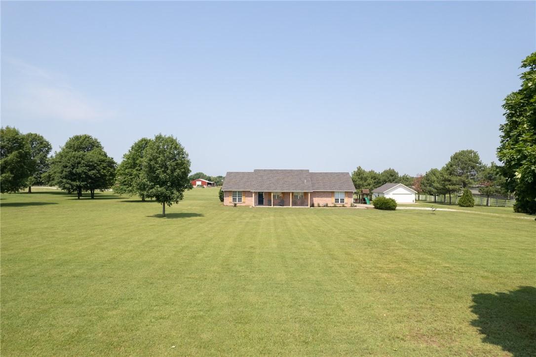 BACK ON THE MARKET AT NO FAULT OF THE SELLER!
Looking for a little more space? The interior boasts a spacious and open living area perfect for families or entertaining, 2 bedrooms with their own bathrooms, an office or potential 4th bedroom and an oversized master suite. Located in the highly desired West Fayetteville/Tontitown area, this home sits on 2.5 level acres with mature trees and a large 24x24' shop with electricity. This one owner, well kept home is ready for you to make it yours!
Har-Ber School District.