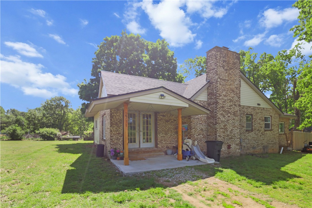 Exceptional Investment Opportunity – 5.17 Acres with Two Homes! Don’t miss your chance to own this unique property featuring two homes on a spacious 5.17-acre lot. Conveniently located 2.9 miles from Downtown Rogers, 3 miles from Beaver Lake and 5.6 miles from the Pinnacle Hills Promenade.
Home 1 offers approximately 1,330 sq ft with 3 bedrooms, 1 full bath, and two living areas. Recently remodeled, it features a new HVAC system and updated kitchen and bathroom countertops—move-in ready and full of comfort. Home 2, built in the 1950s, is approximately 1,160 sq ft with 2 bedrooms and 2 bathrooms. With solid bones and classic charm, it’s the perfect candidate for a remodel to reveal its full potential. This picturesque property includes a small pond and is ideal for a multi-generational family compound, rental, or guest accommodations. With room to expand and endless possibilities, this is a rare opportunity you won’t want to pass up!