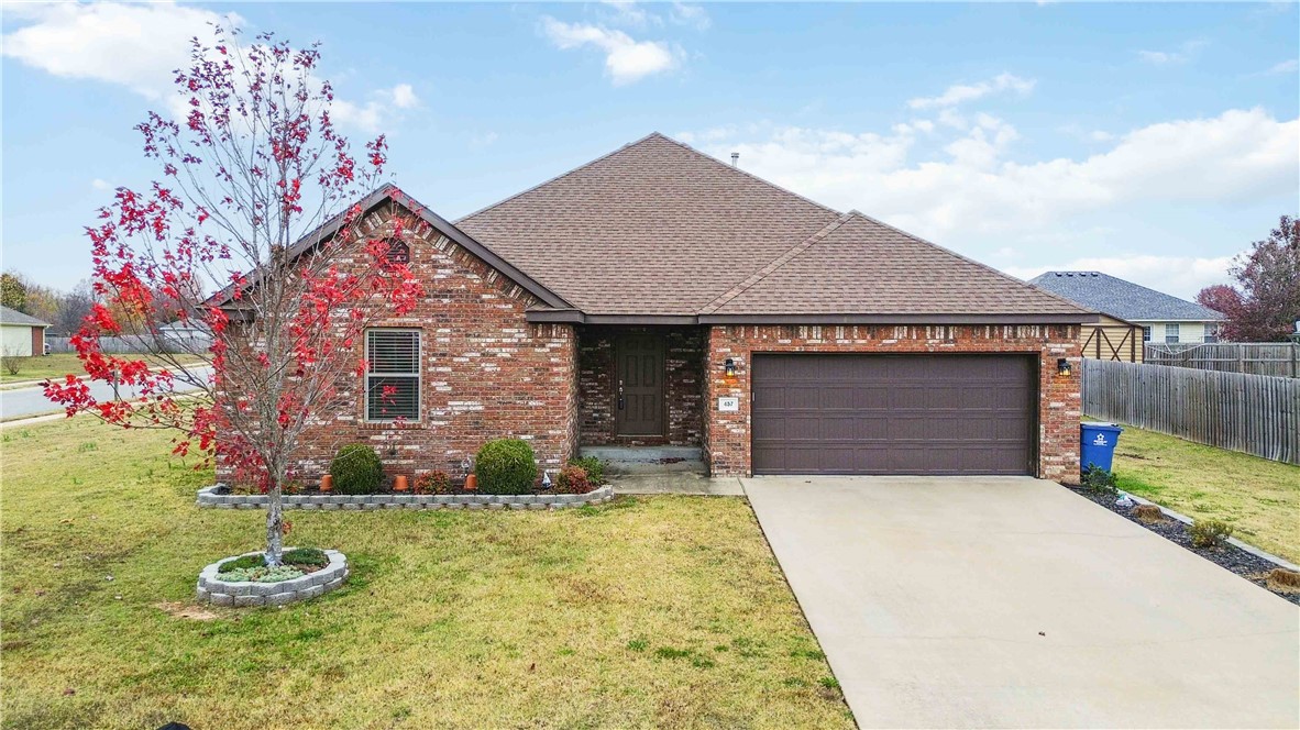Beautiful All brick 3 bedroom, 2 bath, 2 Car Garage home with Custom Cabinets, Granite Counter-tops, Stainless Steel Appliances, Gas Fireplace, split floor plan, Covered Patio. Carpet in bedrooms and Wood look tile throughout rest of house. Comes with Washer, Dryer and refrigerator