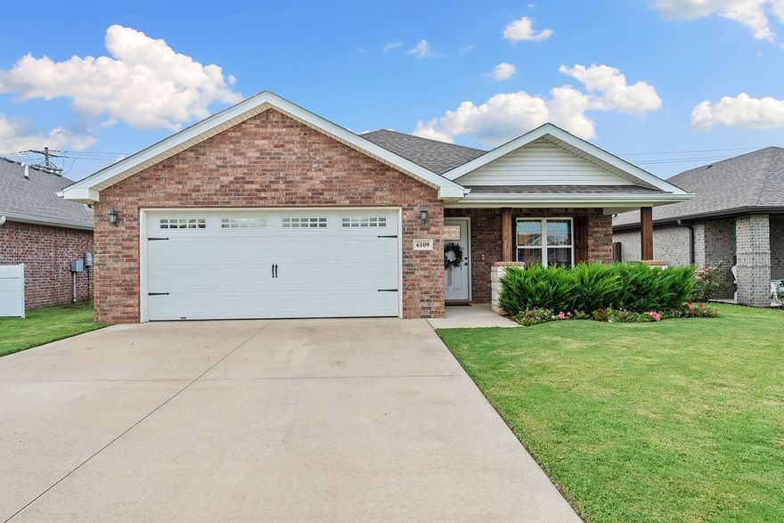 This charming home has been meticulously cared for and sits in a quiet neighborhood within the popular Bentonville School District. It’s just minutes from XNA Airport, so travel is super convenient. Inside, you’ll find an open floor plan with hardwood flooring in the living room. The kitchen is a standout with granite countertops, stainless steel appliances, a big island, and plenty of storage with a handy pantry cabinet. Step outside to enjoy the covered patio and a private, flat backyard with a wood privacy fence—perfect for relaxing or entertaining.