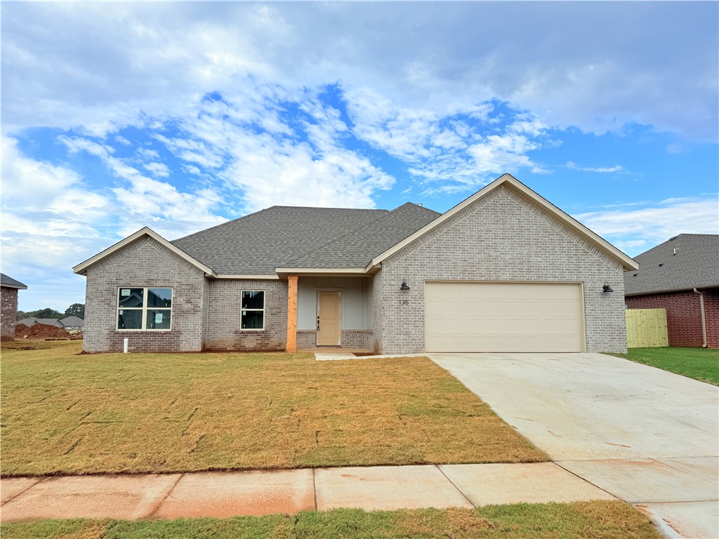 Beautifully crafted new build offering an airy open floor plan with vaulted ceilings, durable wood-look tile, and a welcoming gas fireplace. The kitchen impresses with sleek granite countertops, stainless steel appliances including a gas range, a bold island with bar seating, and a classy tile backsplash. The private primary suite highlights a tray ceiling, spa-inspired bath with dual sinks, soaking tub, a fully tiled shower, and a generous walk-in closet. Outside, enjoy a covered patio and fully fenced yard—complete with blinds, gutters, and a two-car garage