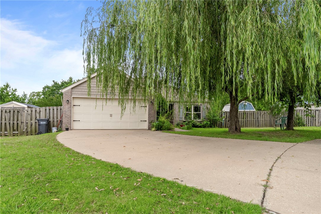 Welcome to 2302 S 12th Pl, Rogers, AR! This charming 3-bedroom, 2-bath home offers 1,244 sq ft of comfortable living on a spacious 0.19-acre cul-de-sac lot. Built in 2006, the home features a open functional layout, ideal for families or first-time buyers. Enjoy the convenience of being just minutes from top-rated schools, shopping centers, restaurants, and major roads—only 5 minutes to I-49 for an easy commute. Located near the Pinnacle Hills Promenade, Walmart AMP, and the Razorback Greenway, there’s always something to do! Relax at nearby parks like Veterans Park or take a short drive to Lake Atalanta for outdoor fun. This home combines quiet cul-de-sac living with unbeatable access to all that Rogers has to offer. Don’t miss out on this great opportunity!
Schedule your private tour today!
Shed and appliances convey with the house!