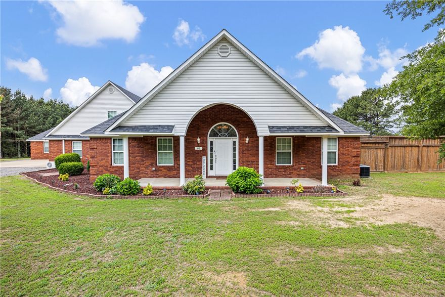 Stunning one-of-a-kind property on 4.58 acres offering space, flexibility, and an entertainer’s dream setup! This 3,913 sq ft home features a total of 7 bedrooms and 5.5 baths. The main home includes 5 bedrooms, 3.5 baths, spacious living areas, and a cozy wood-burning fireplace. Attached is a full guest house complete with its own kitchen, utility room, living room with wood-burning fireplace, and 2 additional bedrooms each with private full bath—ideal for guests, extended family, multi-generational living, or rental potential. Step outside to a stunning fully wood privacy fenced backyard featuring a beautiful in-ground pool and incredible covered entertainment area with bar seating, stage/pavilion space, and multiple gathering areas perfect for hosting parties, game days, cookouts, or relaxing evenings by the pool. A rare property with endless possibilities, privacy, and amenities difficult to find in one package!