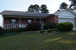 HARD TO FIND !! IMMACULATE 1689 SF HOME 3BR/2BA WITH A SHOP SITTING ON 1 AC M/L ON THE OUTSKIRTS OF TOWN! This home features an open concept floor plan, living area has a f/p, the kitchen has a breakfast bar as well as a breakfast nook. Unbelievable energy efficient home all electric, the average utility bill is $70-$80 , architectural shingles approx. 6 yr old!! Lets talk shop... literally . The shop is insulated 24x30 two bay doors, a mans dream shop all the way. Storage building and also a carport round out amazing listing.