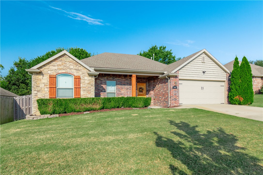 Well-maintained home in the sought after Cobblestone subdivision! Located in Northwest Fayetteville, this home is convenient to all of Fayetteville including: i-49, HWY 112, schools (Holcomb, Holt, & U of A), parks, trails, shopping, dining, and so much more! Home features, a spacious open kitchen with beautiful granite counter tops, stainless steel gas range, built in benches in the dining nook, a formal dining or office area, a private backyard backing up to mature trees, a covered back porch extended by a wood pergola, no carpet (wood, vinyl and tile floors throughout), large primary bathroom, private ensuite with walk in shower and jacuzzi tub, cozy front porch, and fully fenced backyard!