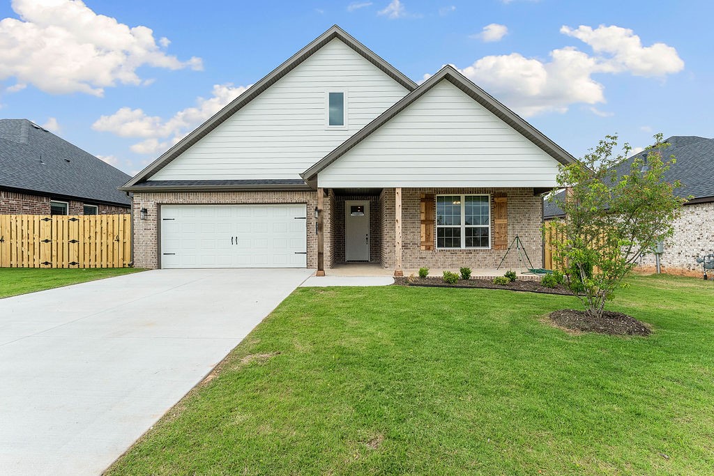 Pea Ridge welcomes you to its rapidly growing community. The Yorktown subdivision places you at the heart of it all, offering close proximity to schools, parks, and beautiful scenic views.This lot showcases the Cardinal Plan, where you're welcomed by LVP flooring and bright, airy touches that bring the home to life. All bedrooms are conveniently located on one side of the house, with two bedrooms and a bathroom at the front, while the primary suite is tucked at the back, next to the laundry room and two extra storage spaces. The kitchen, living, and dining areas flow seamlessly together, with the kitchen offering ample storage, including a walk-in shelved pantry. Enjoy outdoor living with both covered front and back patios.For a limited time rates starting at 4.99% OR $7,500 from builder & up to $4K from preferred lender. For access to see all the homes stop by the model home at 1602 Christman St. Open Monday, Tuesday,Thursday, and Friday from 10-4 and Sunday 1-4.